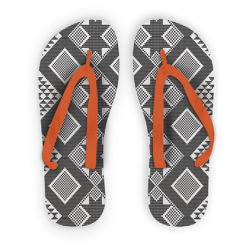Black & white flip flop with orange strap